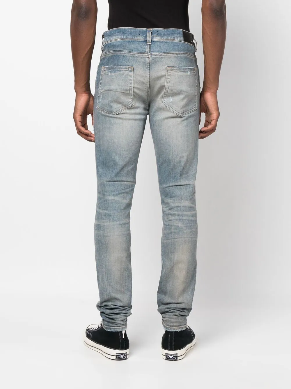 AMIRI distressed skinny jeans