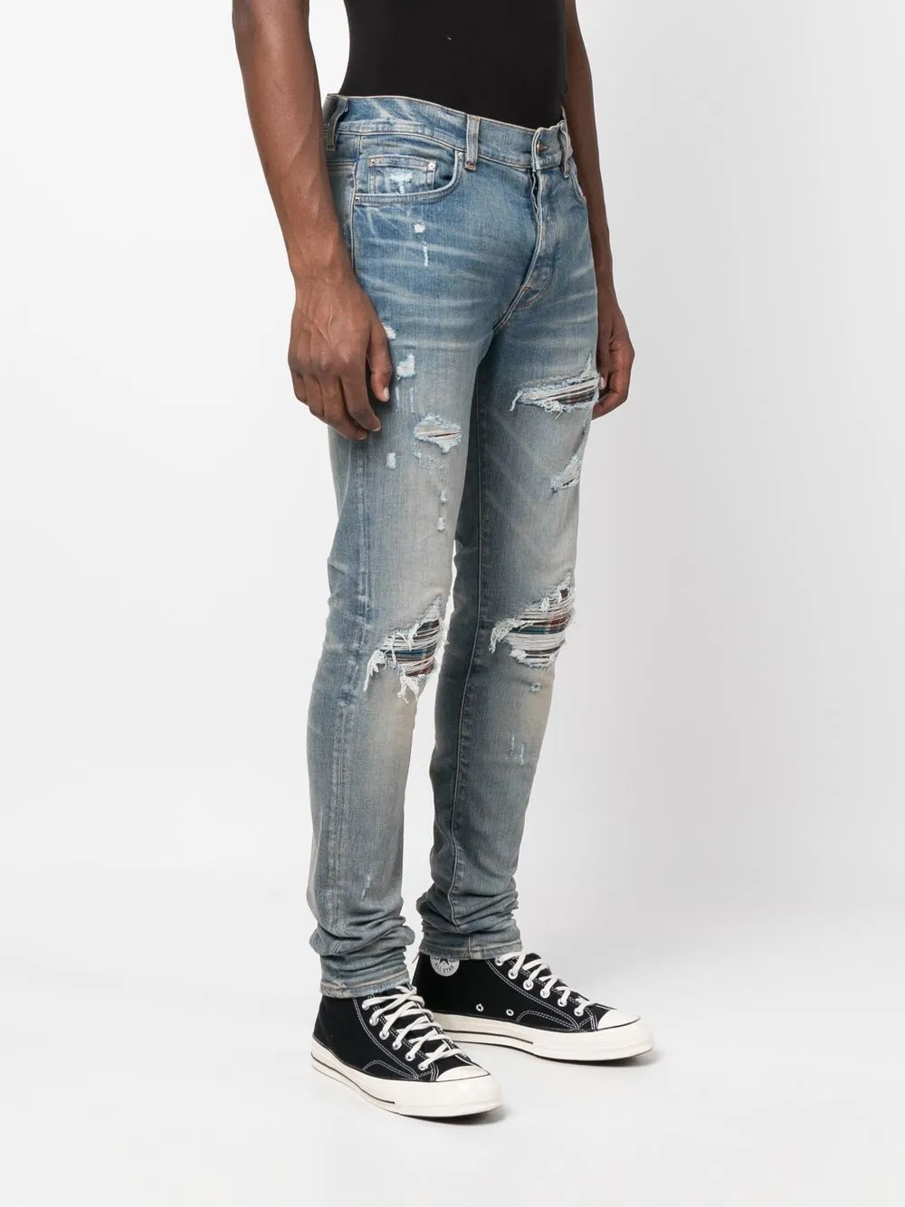 AMIRI distressed skinny jeans