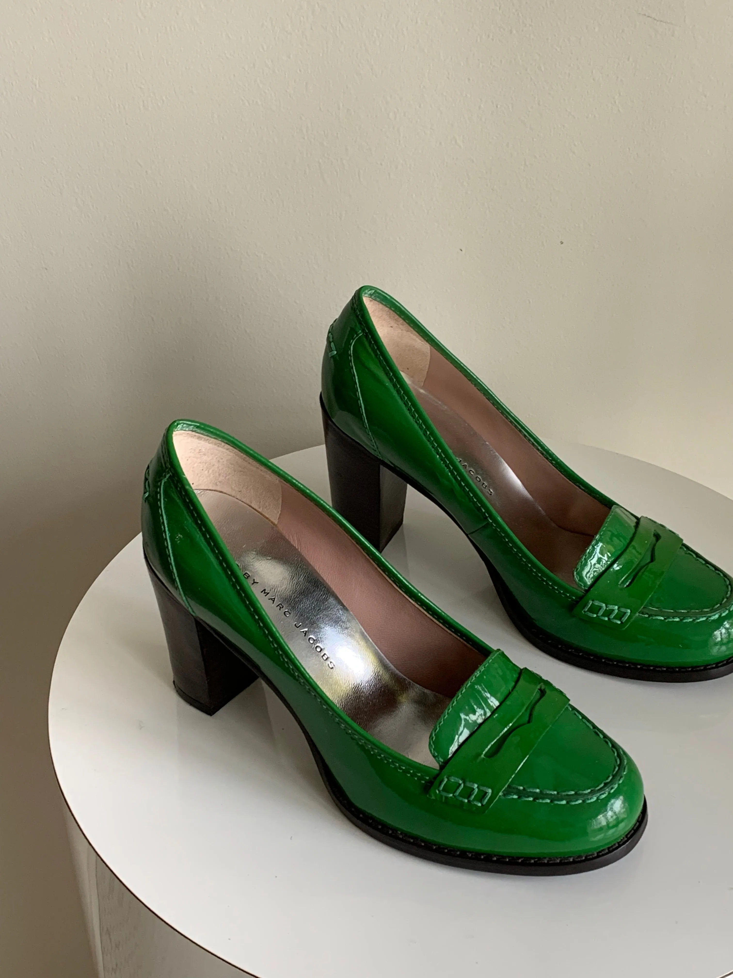 green heeled loafers