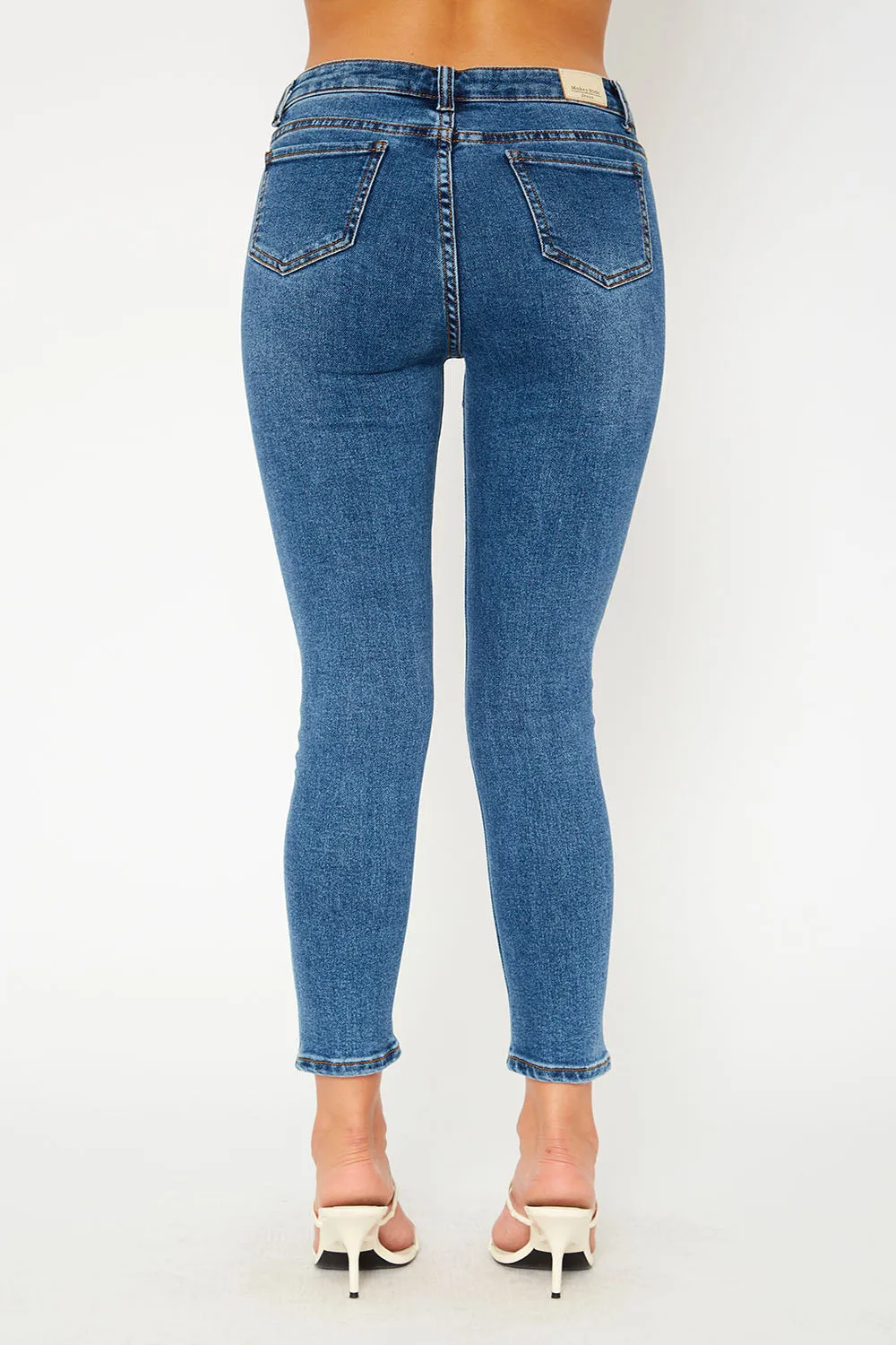 High-rise medium blue skinny jeans