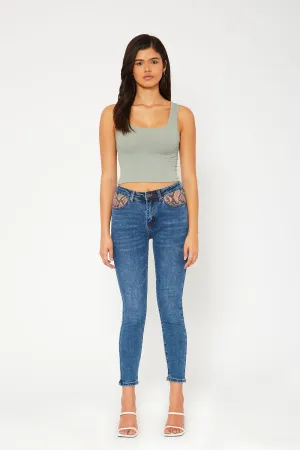 High-rise medium blue skinny jeans