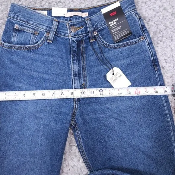 Levi’s Premium 80's Mom Jeans High Rise Tapered Distressed Size 26 x 30 Revolve