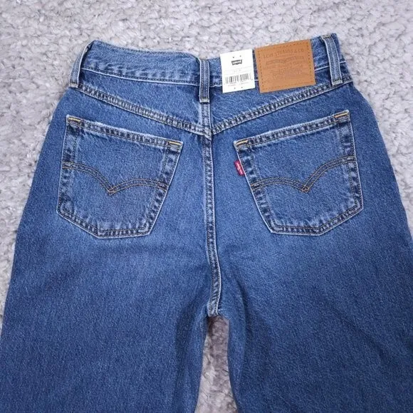 Levi’s Premium 80's Mom Jeans High Rise Tapered Distressed Size 26 x 30 Revolve