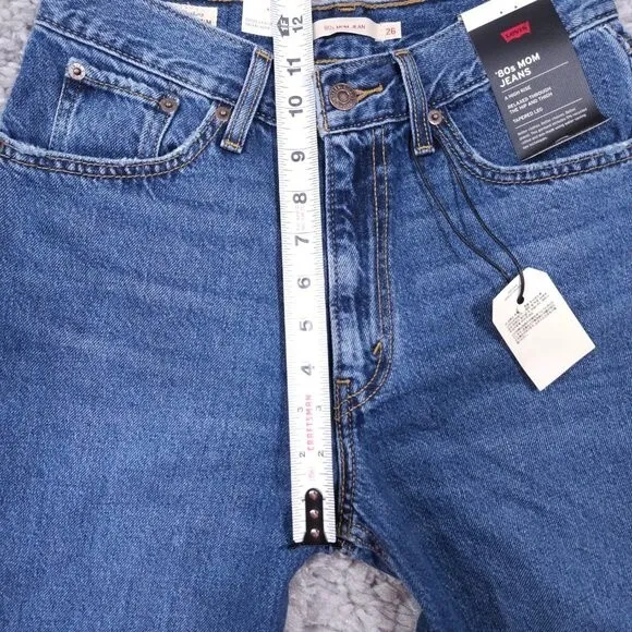 Levi’s Premium 80's Mom Jeans High Rise Tapered Distressed Size 26 x 30 Revolve
