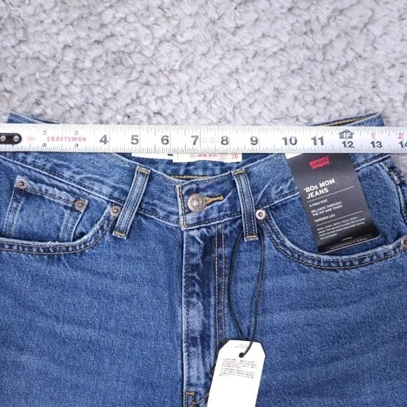 Levi’s Premium 80's Mom Jeans High Rise Tapered Distressed Size 26 x 30 Revolve