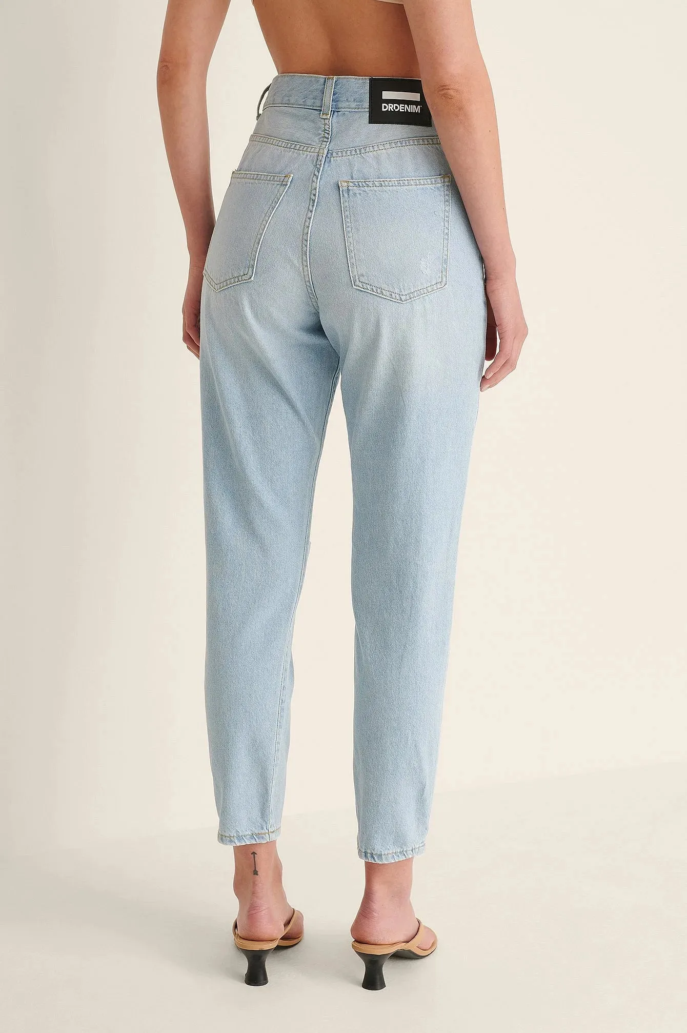 Light Blue Ripped Mom Jeans - Trendy & Edgy