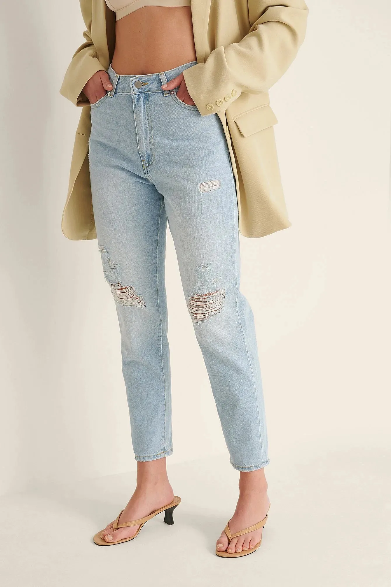 Light Blue Ripped Mom Jeans - Trendy & Edgy