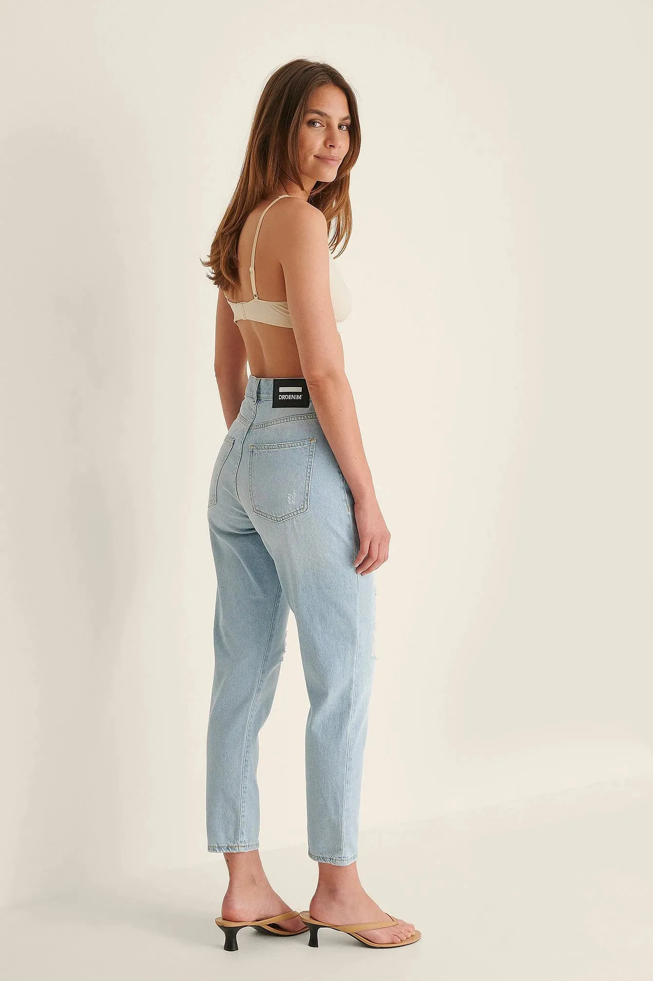 Light Blue Ripped Mom Jeans - Trendy & Edgy