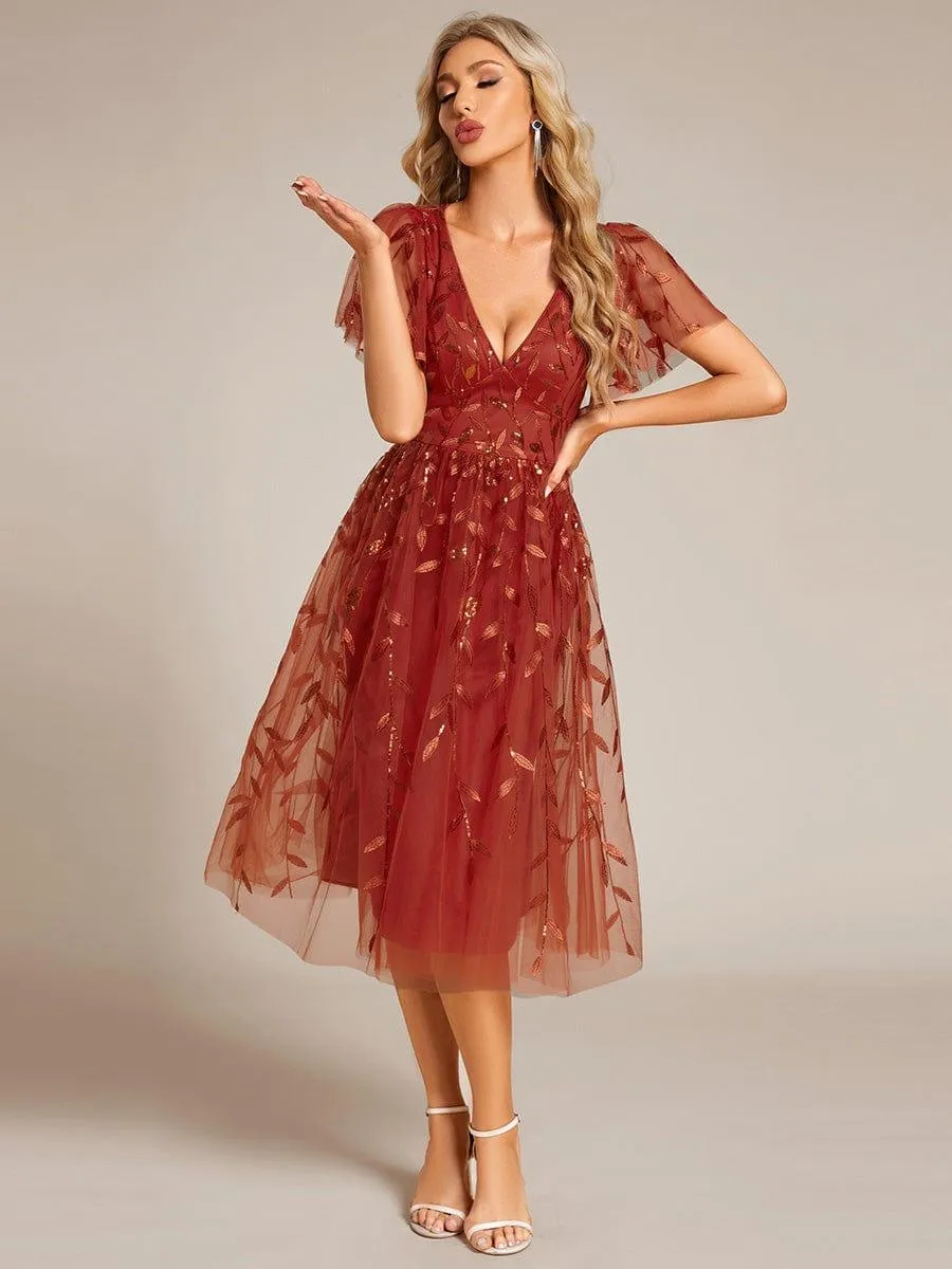 Robe d'invité de mariage formelle mi-longue à paillettes et feuilles à manches courtes