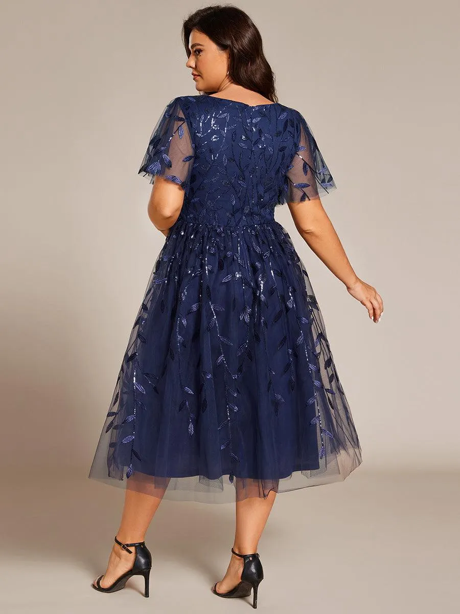 Robe d'invité de mariage formelle mi-longue à paillettes et feuilles à manches courtes