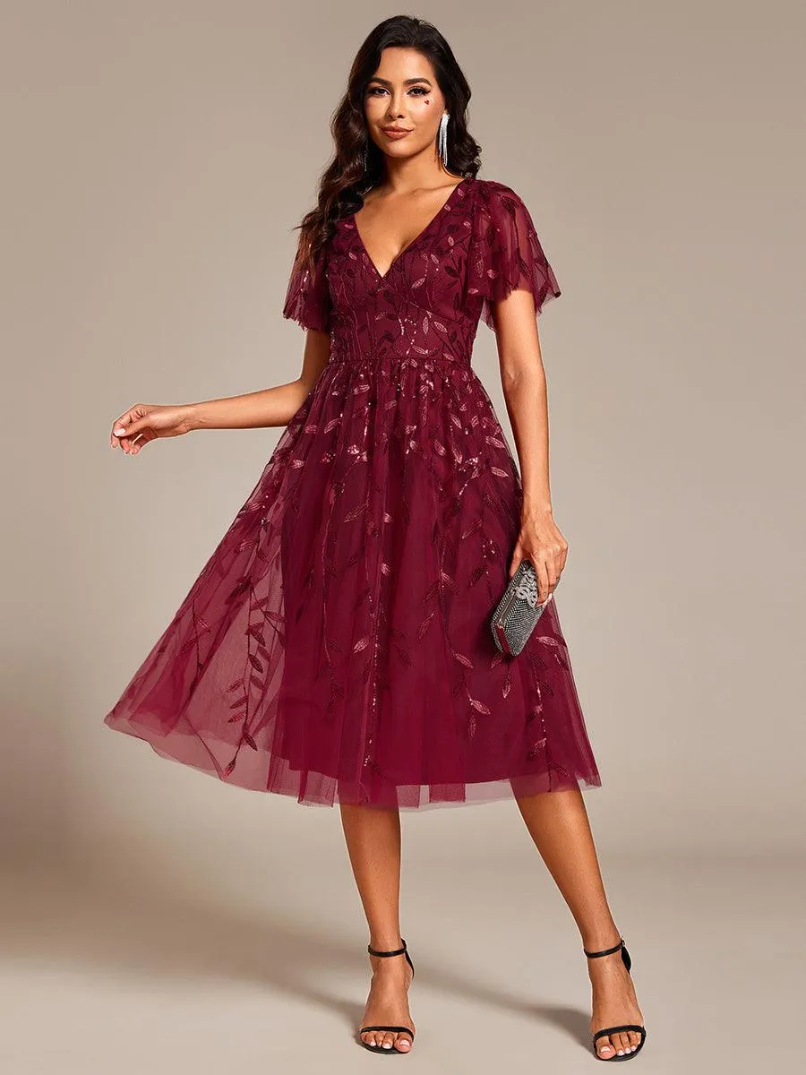 Robe d'invité de mariage formelle mi-longue à paillettes et feuilles à manches courtes