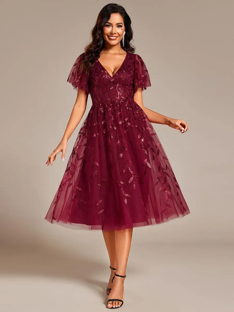 Robe d'invité de mariage formelle mi-longue à paillettes et feuilles à manches courtes