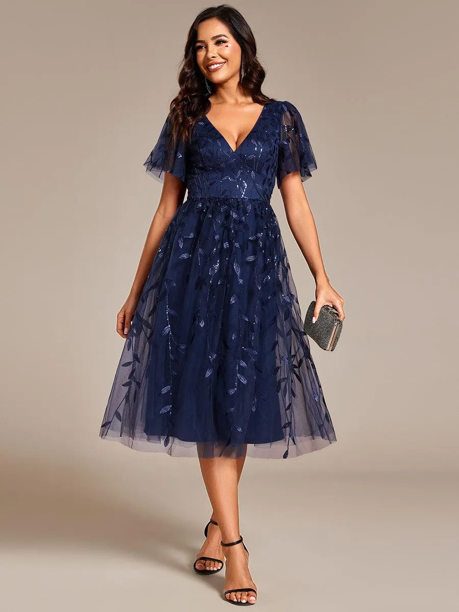 Robe d'invité de mariage formelle mi-longue à paillettes et feuilles à manches courtes