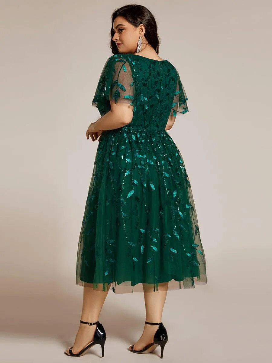 Robe d'invité de mariage formelle mi-longue à paillettes et feuilles à manches courtes