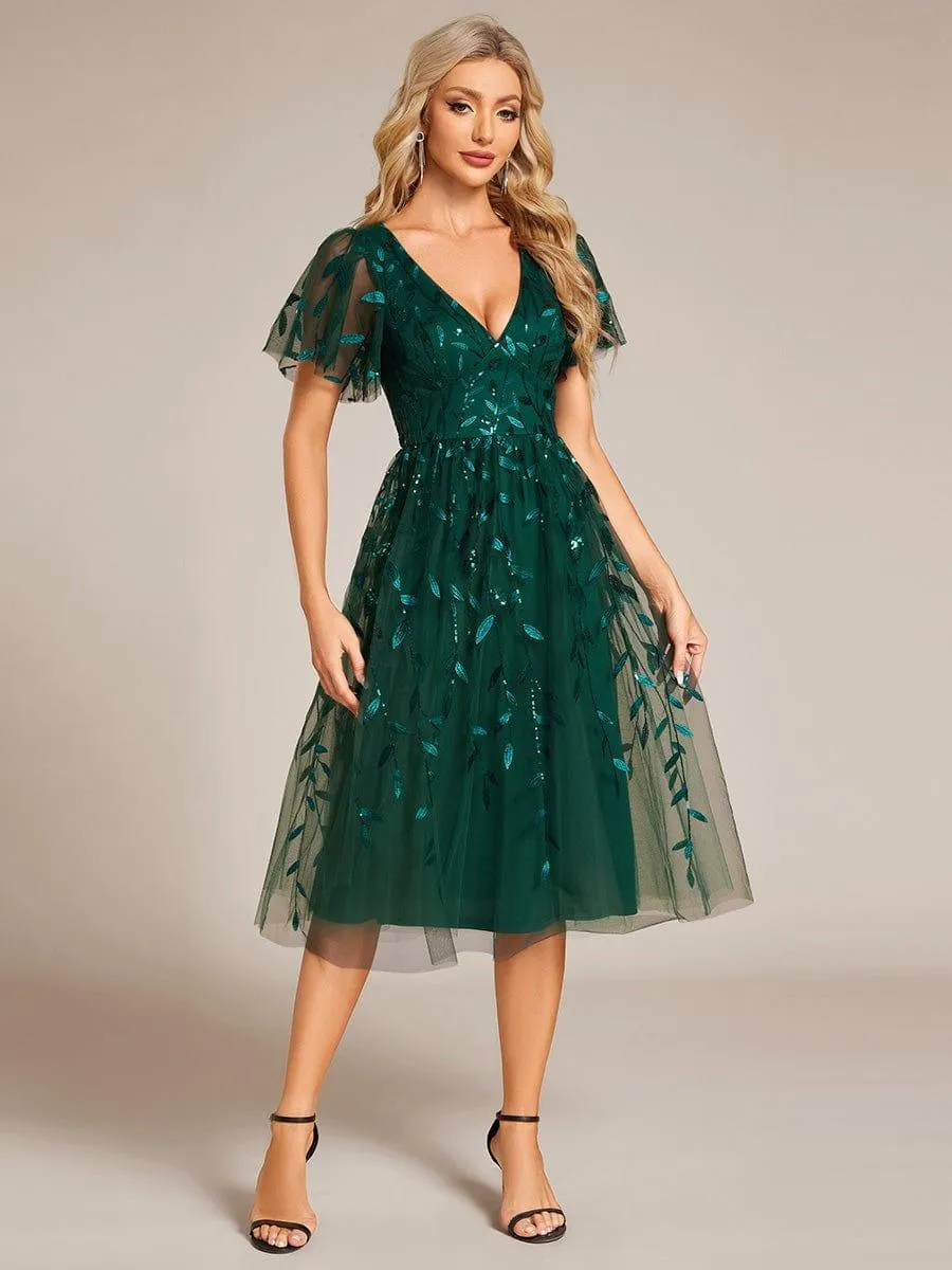 Robe d'invité de mariage formelle mi-longue à paillettes et feuilles à manches courtes