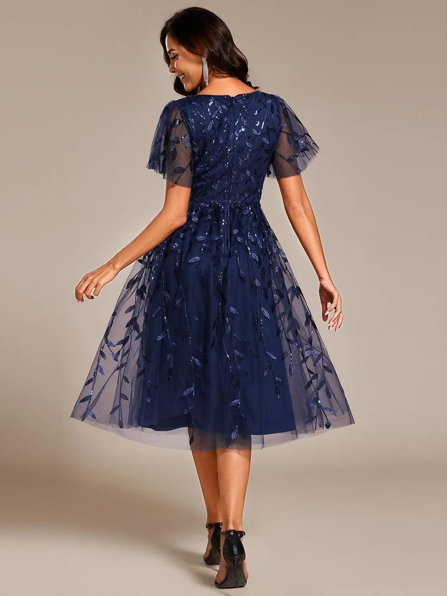 Robe d'invité de mariage formelle mi-longue à paillettes et feuilles à manches courtes