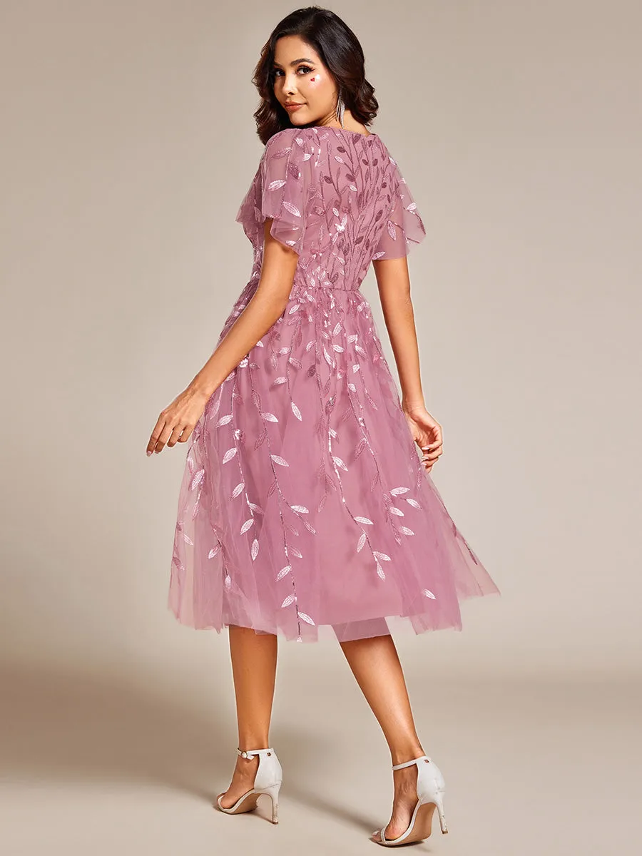 Robe d'invité de mariage formelle mi-longue à paillettes et feuilles à manches courtes
