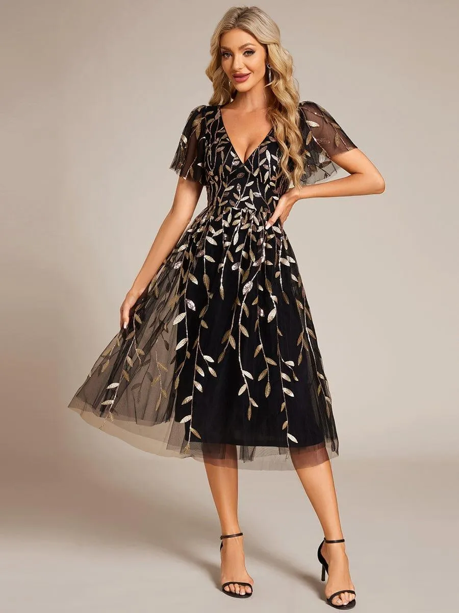 Robe d'invité de mariage formelle mi-longue à paillettes et feuilles à manches courtes