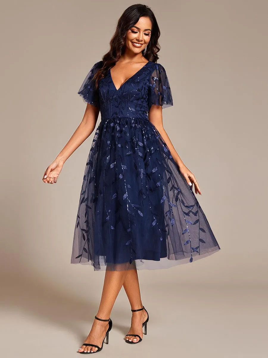 Robe d'invité de mariage formelle mi-longue à paillettes et feuilles à manches courtes