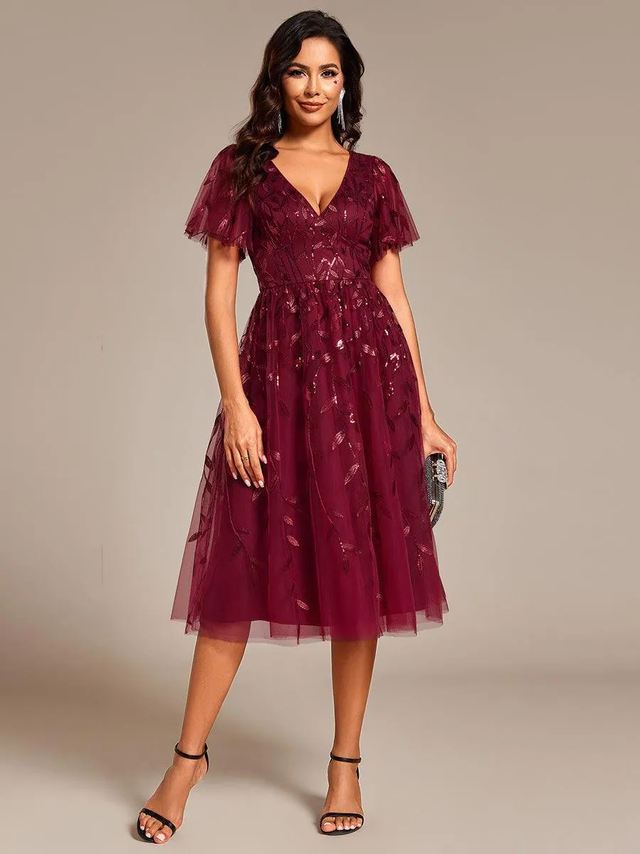 Robe d'invité de mariage formelle mi-longue à paillettes et feuilles à manches courtes