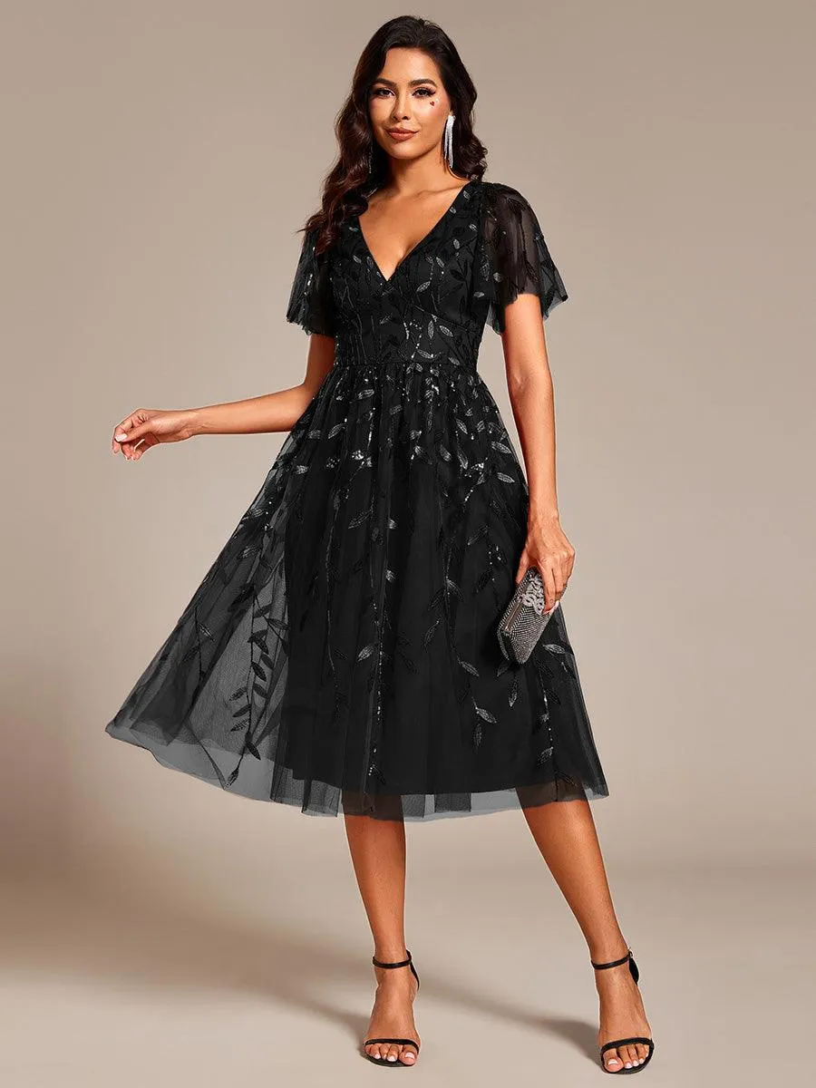 Robe d'invité de mariage formelle mi-longue à paillettes et feuilles à manches courtes