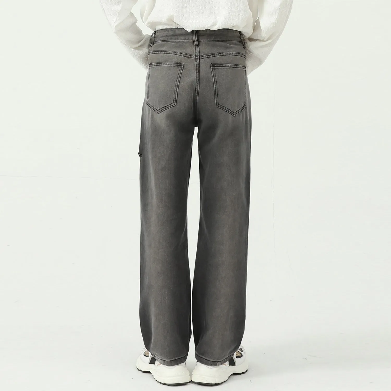 Tie-dye gradient denim jeans with ripped sides