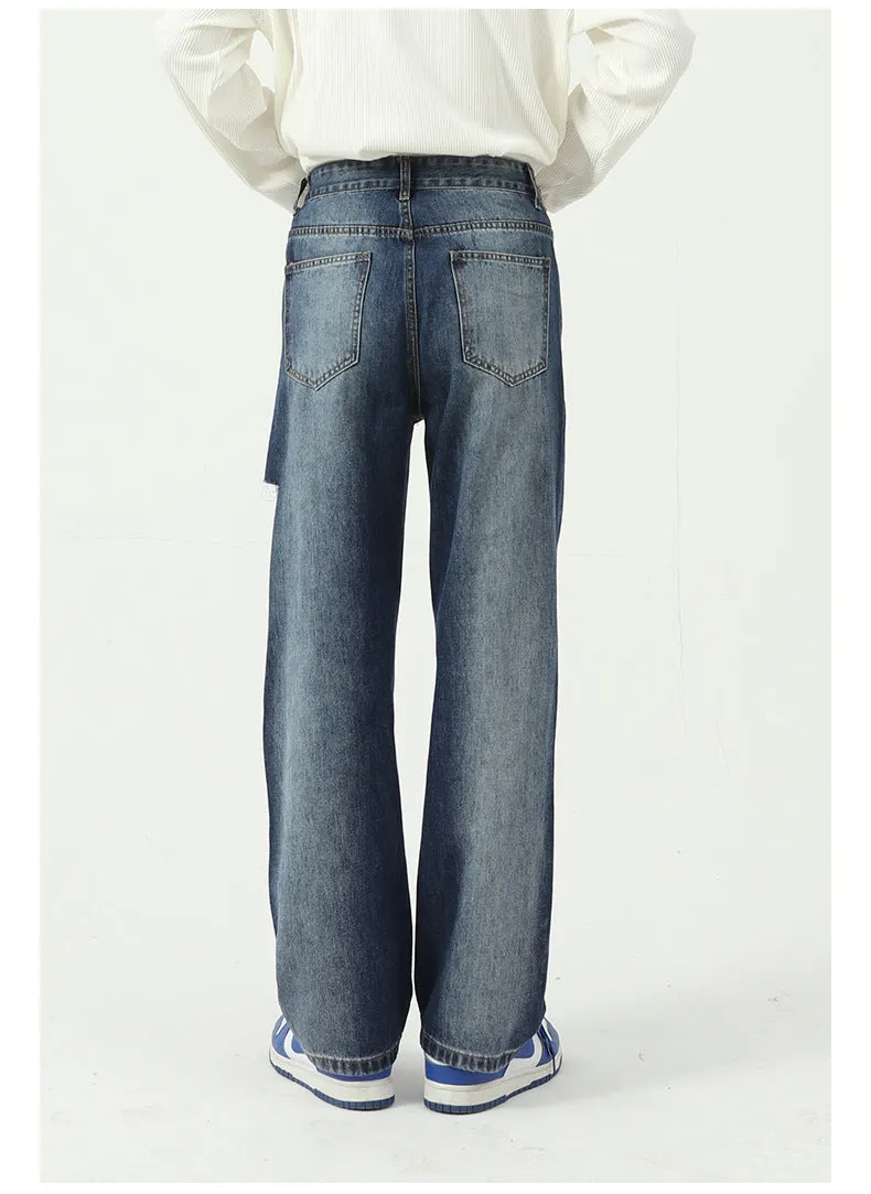 Tie-dye gradient denim jeans with ripped sides