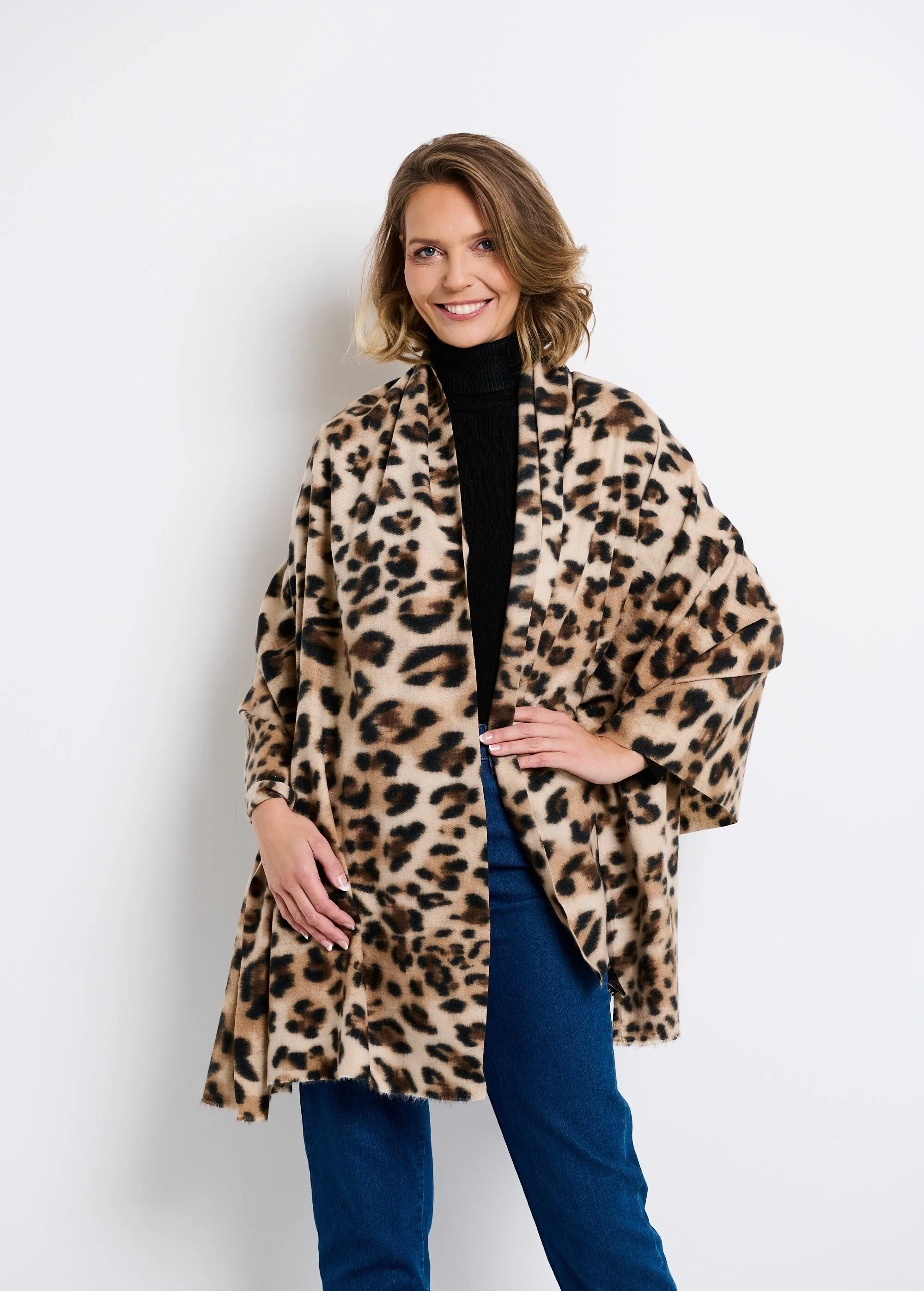 Warm wool scarf with leopard pattern