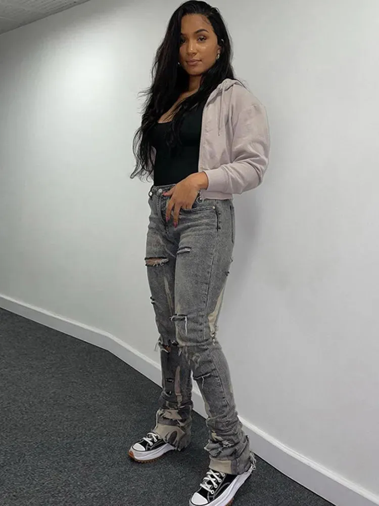 Women's Trendy Ripped Jeans with Holes and Splash Design | Perfect for Casual Days
